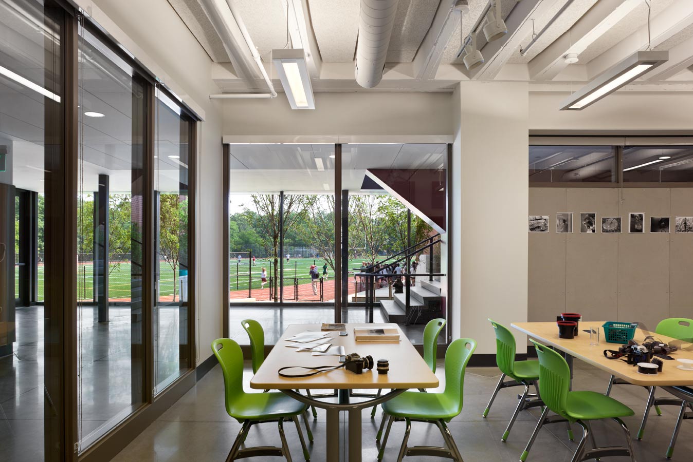 <p>The photography studio looks out to the lower lobby at the bottom of the central stair. Large south-facing windows at the base of the building allow light into the lower level. <br><small>&copy; Michael Moran/OTTO</small></p>