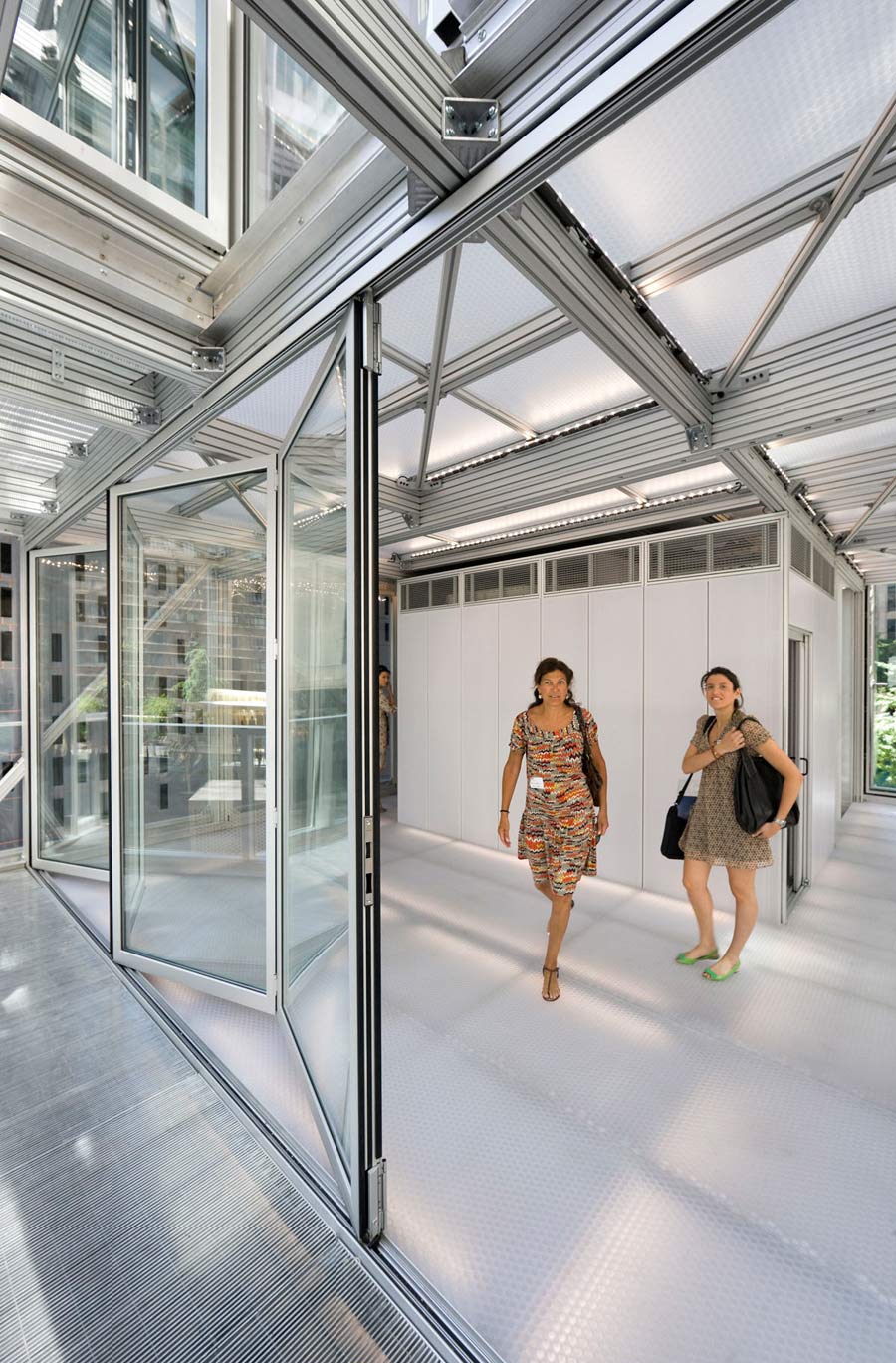 <p>Folding glass doors on one side of the house provided natural ventilation. <br><small>&copy; Peter Aaron/OTTO</small></p>