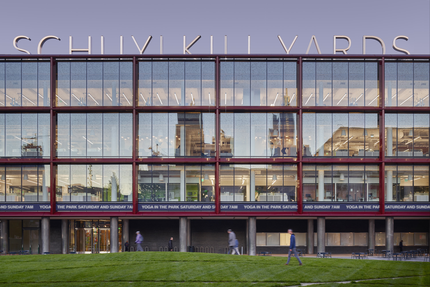 <p>The new facade replaces original brick masonry and 1990s strip windows. Floor-to-floor panels of low-iron, high-performance glazing dramatically expand daylight for deep floorplates, while revealing research activity to the city. | <small>&copy; Daniel Preston</small></p>